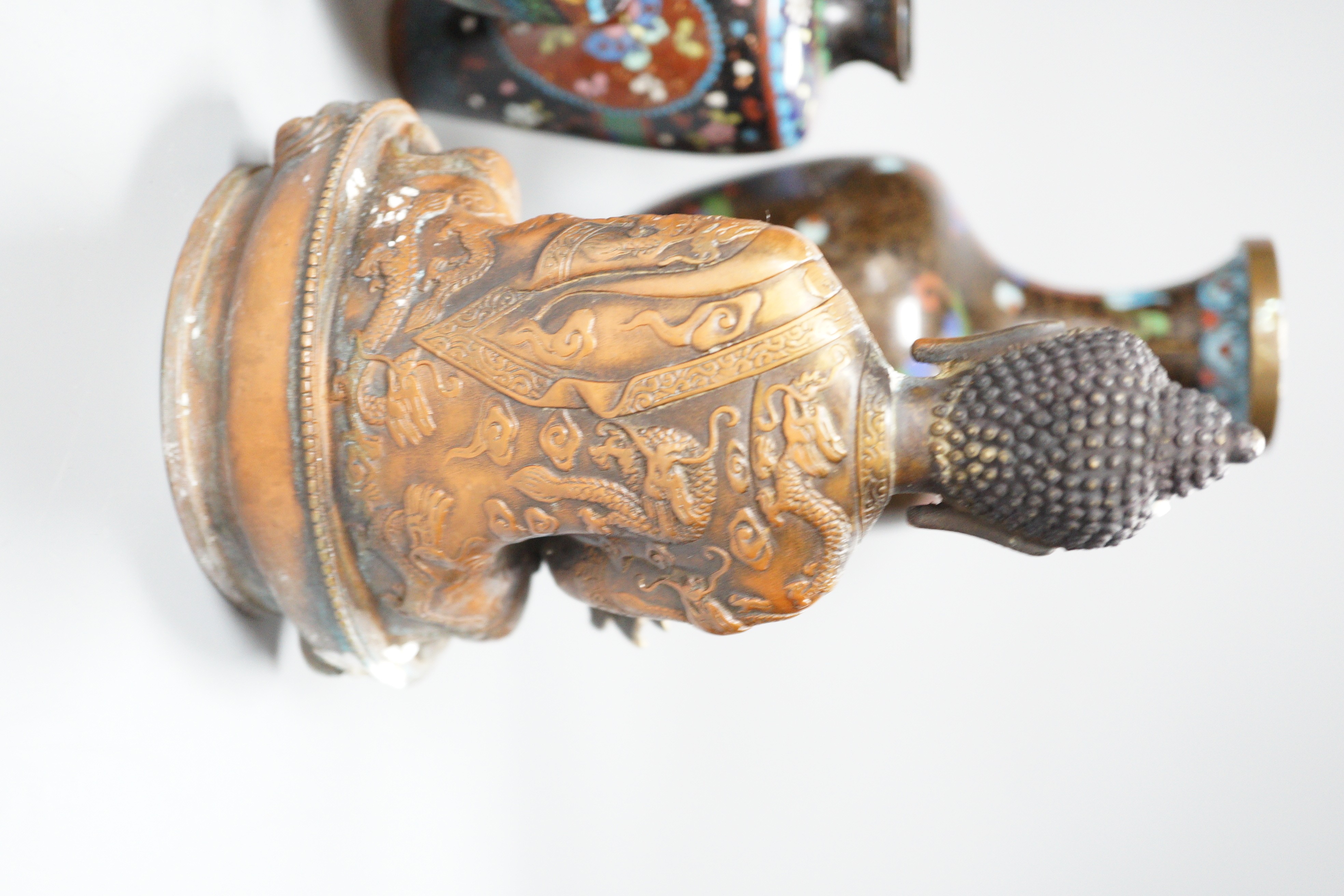 A Himalayan bronze Buddha and a group of Chinese cloisonné vases